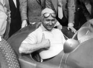Italian Grand Prix at Monza, Argentinian Grand Prix driver Juan Manuel Fangio, the world champion pictured at the wheel of a BRM, as he tests the car at Falkingham Airfield, Lincolnshire, Juan Fangio was five times world champion in the 1950's (Photo by Paul Popper/Popperfoto/Getty Images)